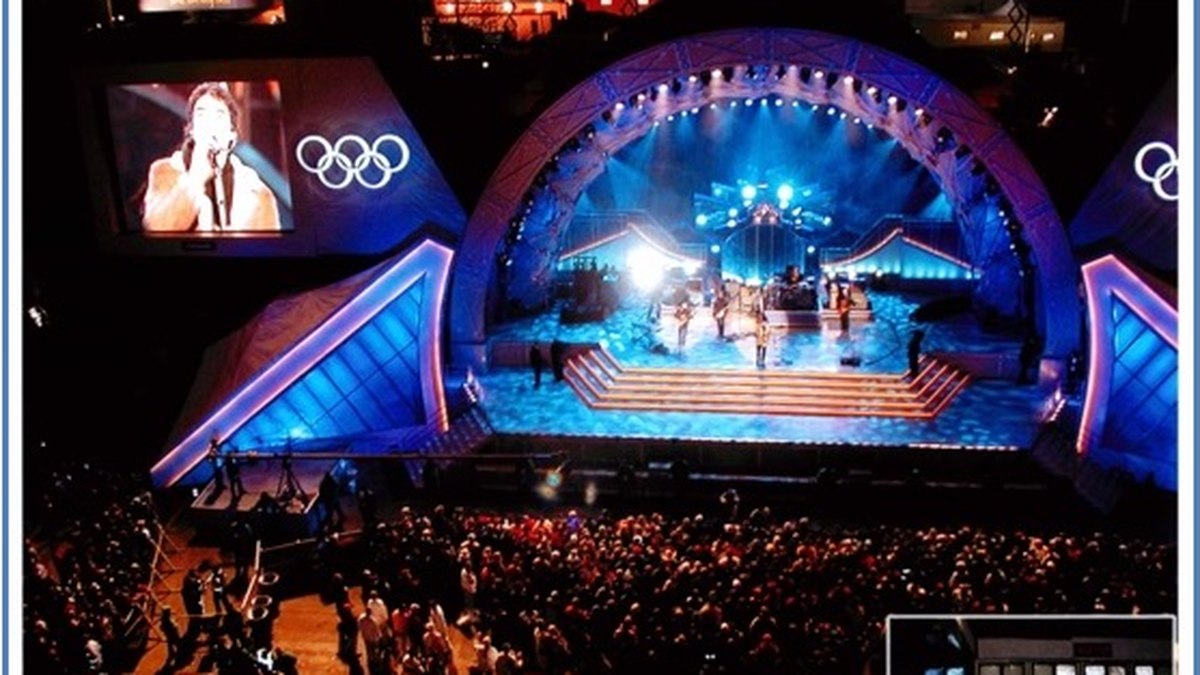 An Olympic medal ceremony stage lit at night