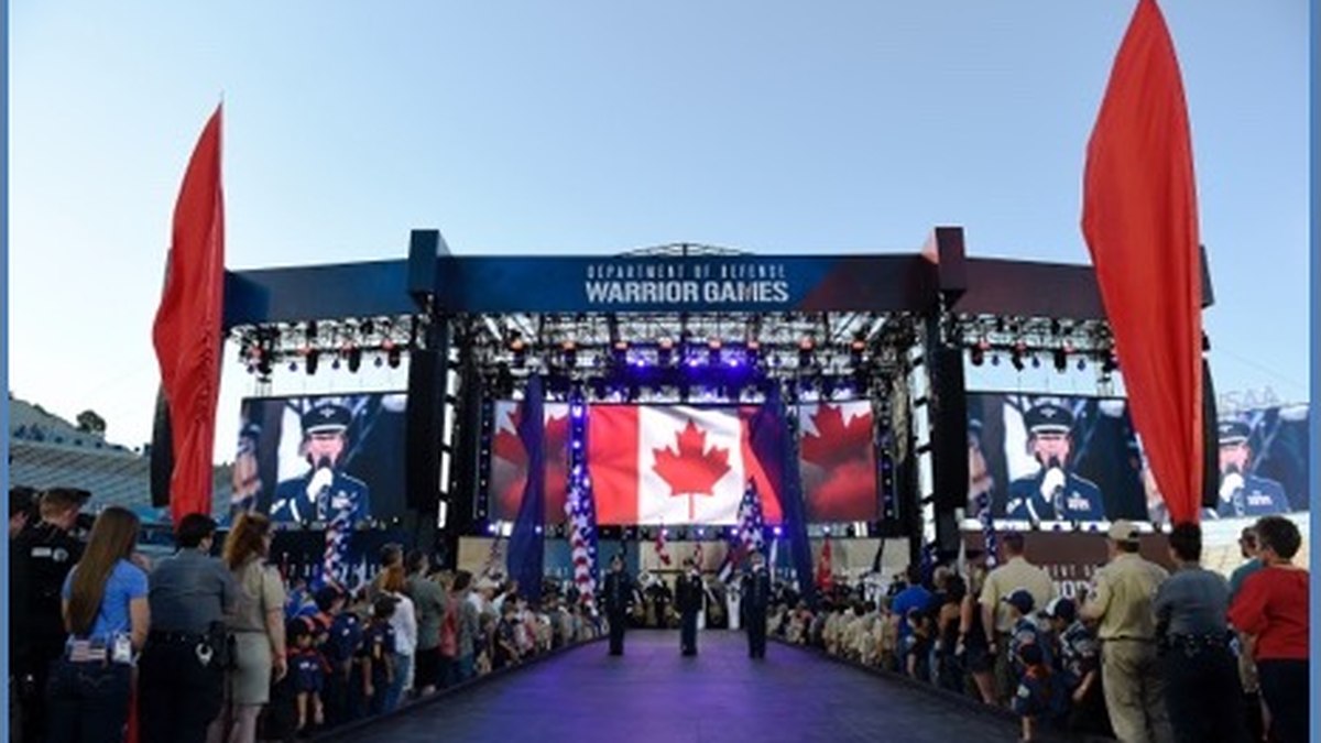 The Department of Defense Warrior Games stage at dusk